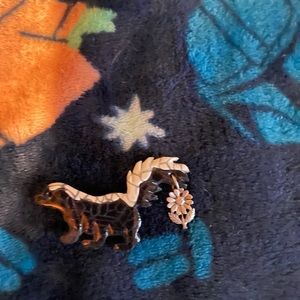 Skunk and Flower Pin